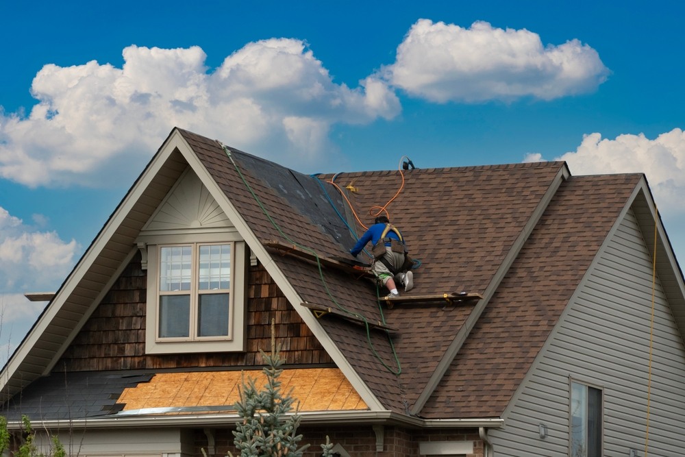 How a Roofing Contractor Can Protect Your Home from Seasonal Damage